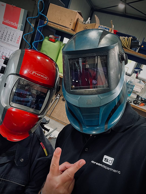 Mitarbeiter mit Schutzkleidung